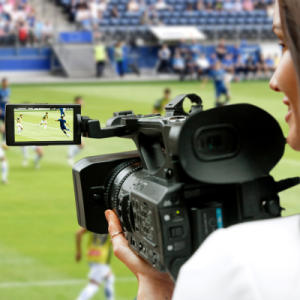 Dynamic sports photographer capturing the essence of athleticism in a thrilling image